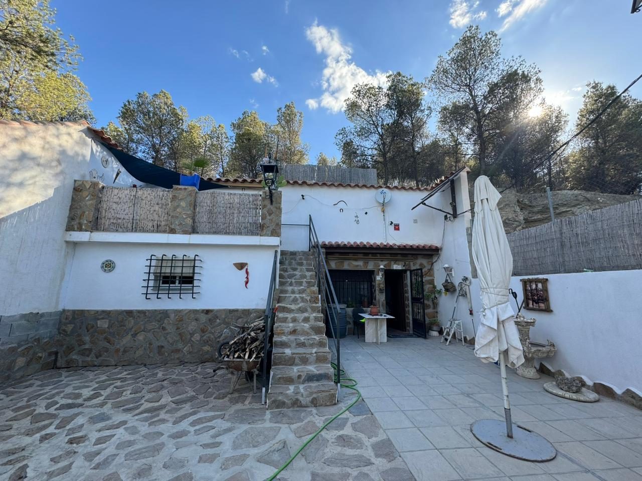 Three-bedroom cave home for sale in Benamaurel, Granada
